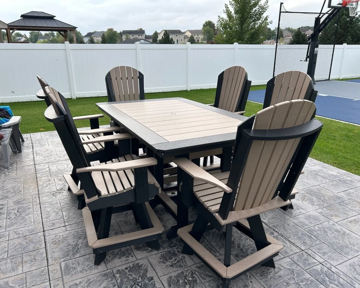Outdoor dining room collection with 6 counter height chairs and table